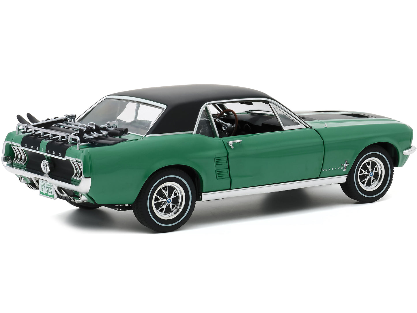 1967 Ford Mustang Coupe Loveland Green Metallic with Black Stripes and Black Top and a Pair of Skis &quot;Ski Country Special&quot; 1/18 Diecast Model Car by Greenlight