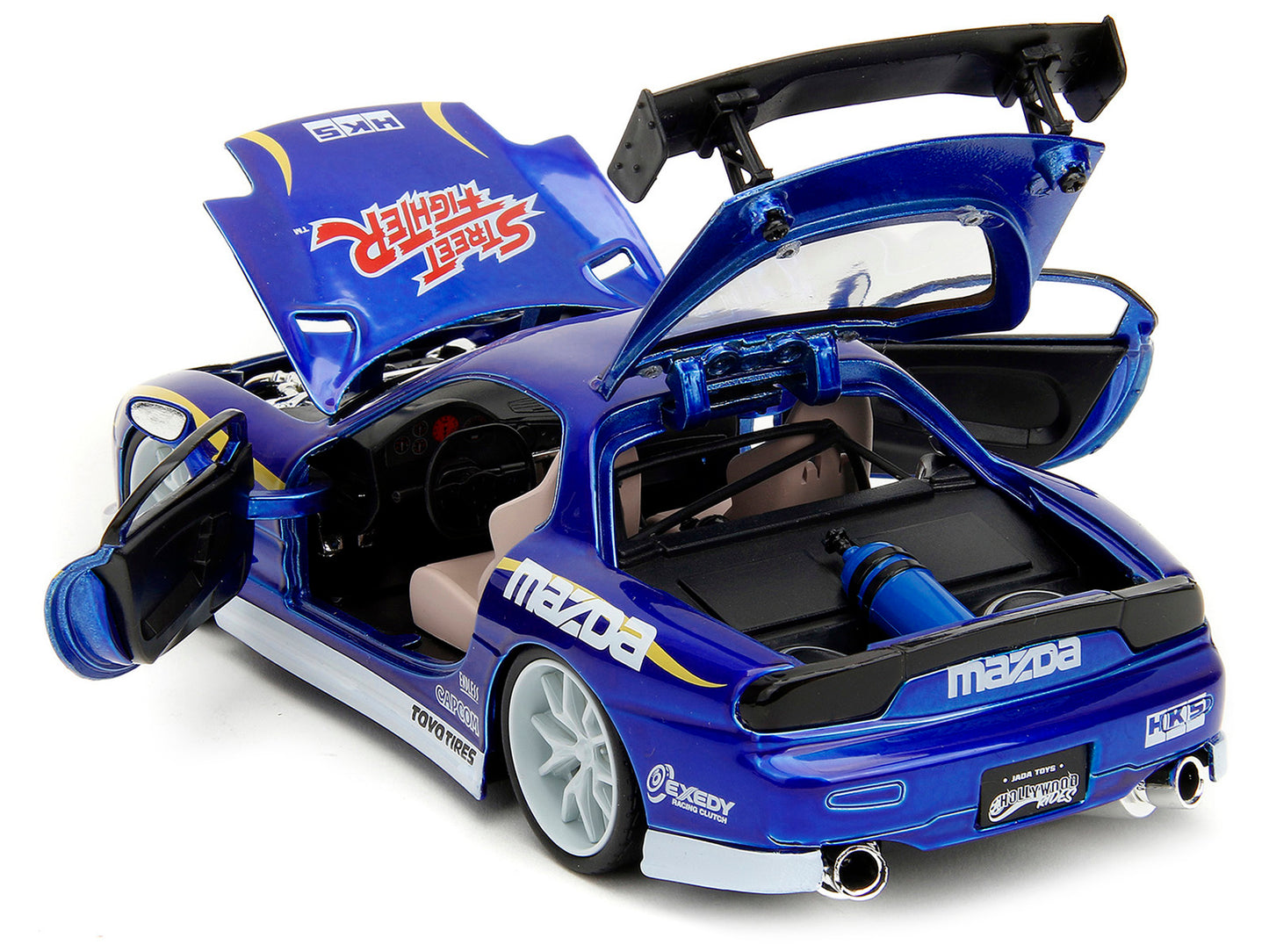 1993 Mazda RX-7 Candy Blue Metallic with Graphics and Chun-Li Diecast Figure &quot;Street Fighter&quot; Video Game &quot;Anime Hollywood Rides&quot; Series 1/24 Diecast Model Car by Jada