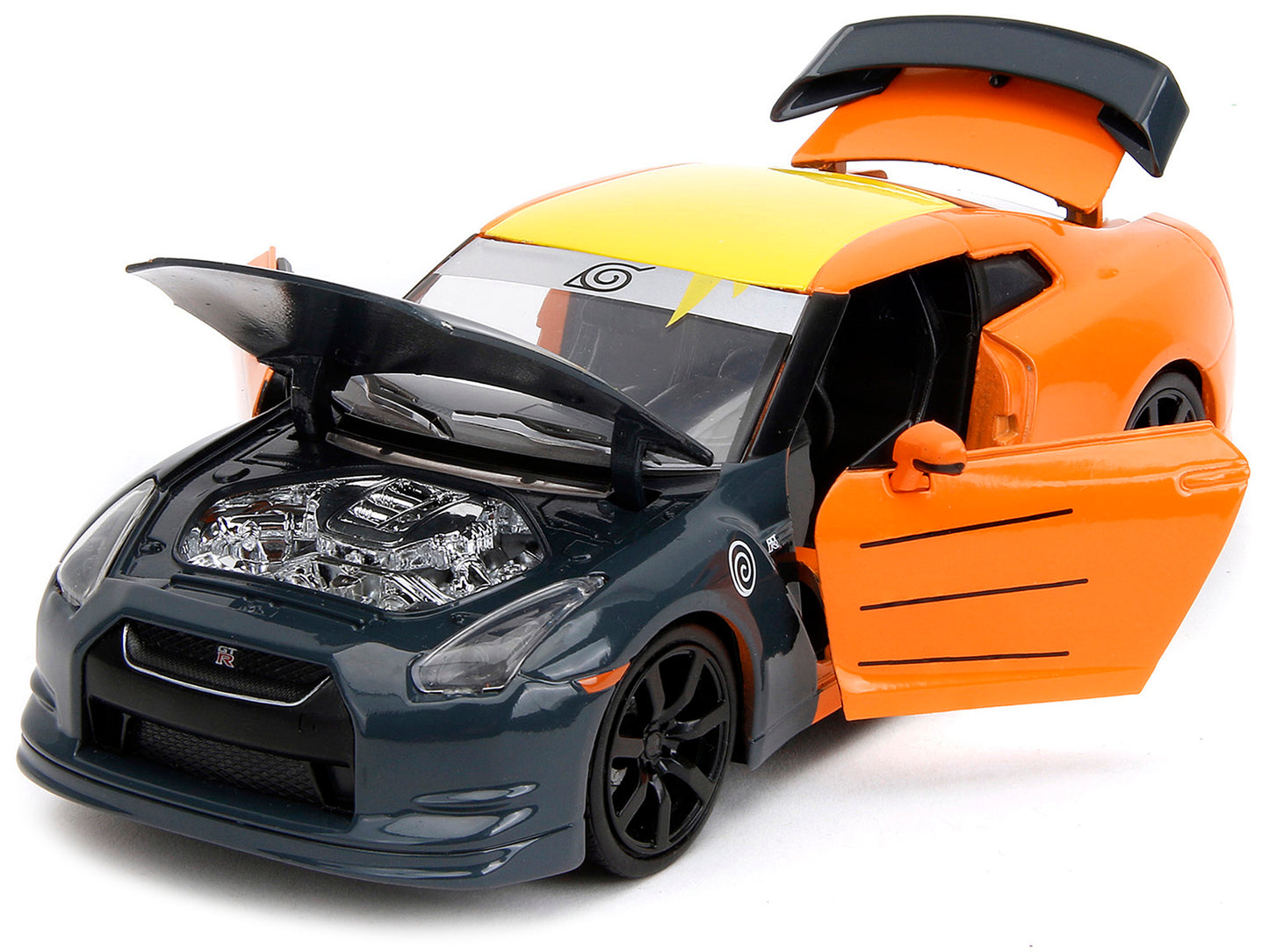 2009 Nissan GT-R (R35) Orange and Dark Gray with Yellow Top and Graphics and Naruto Diecast Figure &quot;Naruto Shippuden&quot; (2009-2017) TV Series &quot;Anime Hollywood Rides&quot; Series 1/24 Diecast Model Car by Jada