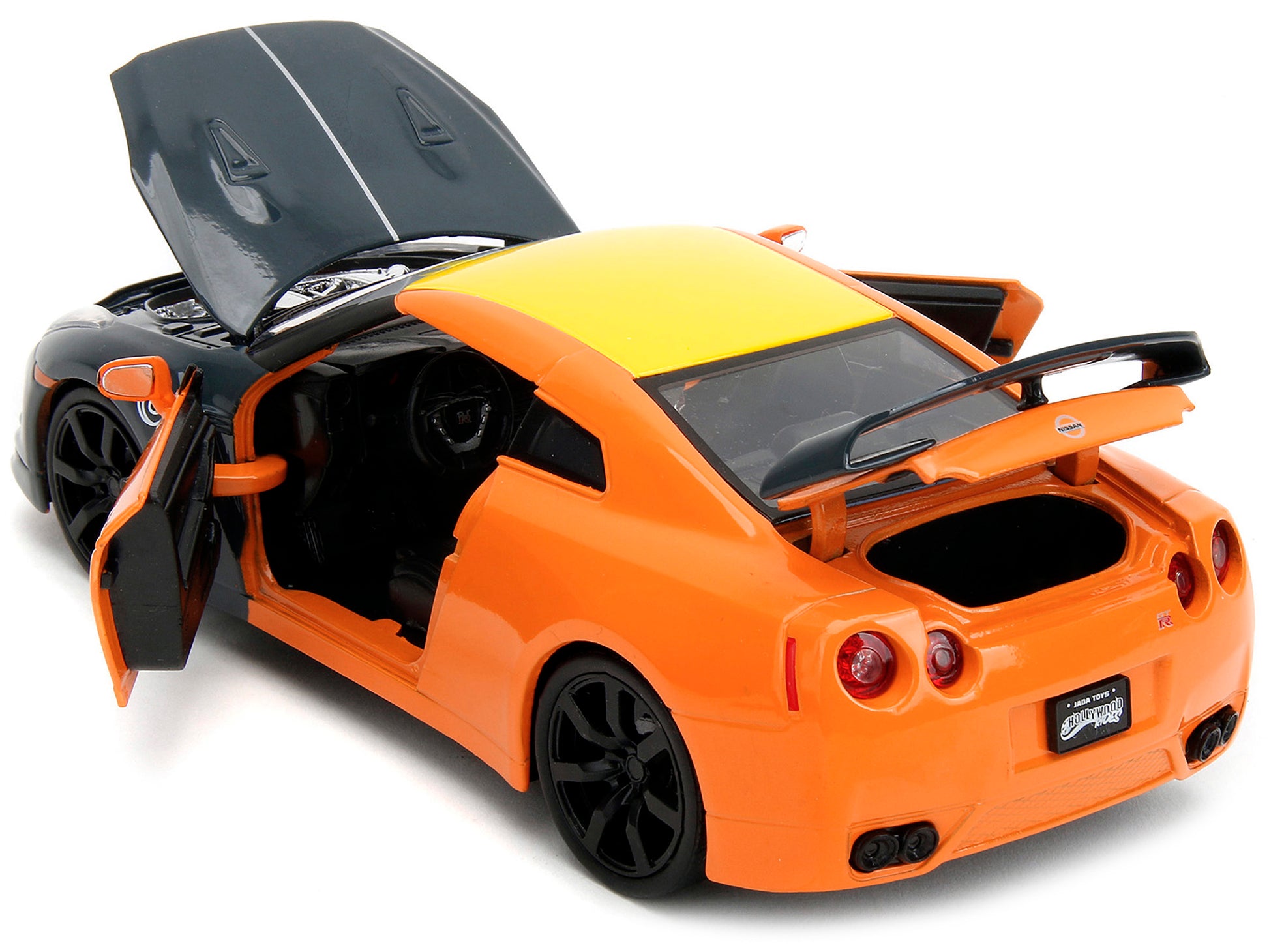 2009 Nissan GT-R (R35) Orange and Dark Gray with Yellow Top and Graphics and Naruto Diecast Figure &quot;Naruto Shippuden&quot; (2009-2017) TV Series &quot;Anime Hollywood Rides&quot; Series 1/24 Diecast Model Car by Jada